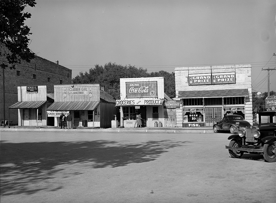 Store buildings on square in Glen Rose Texas in 1939